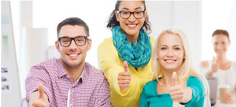 Man and women with smiling face giving thumbs up.